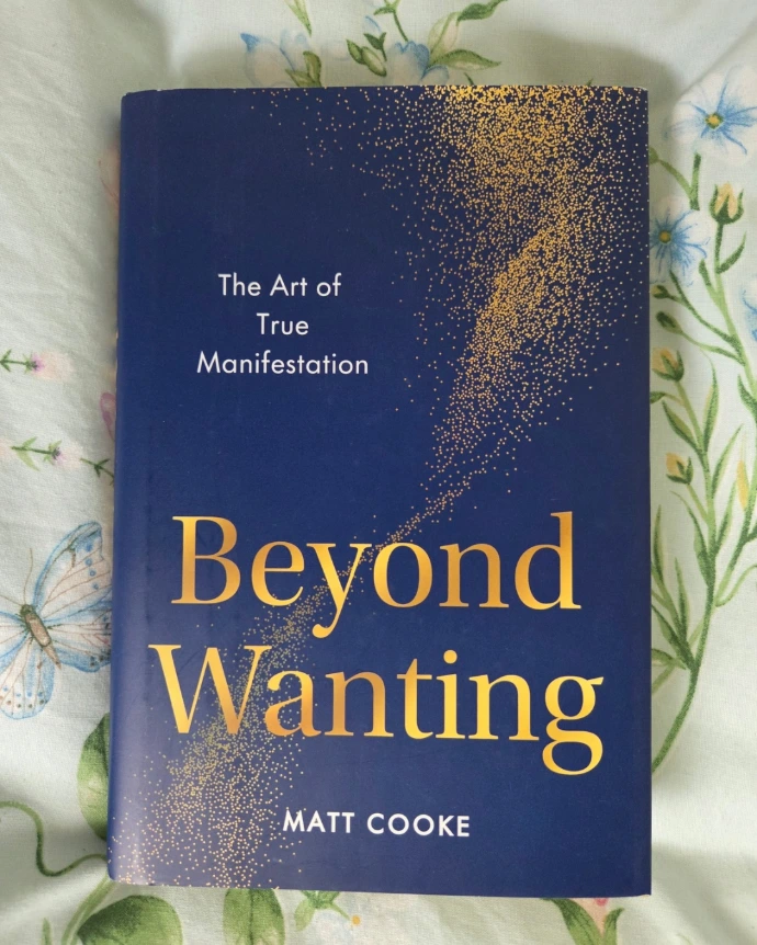 An image of the front of Beyond Wanting by Matt Cook. A navy background with gold text